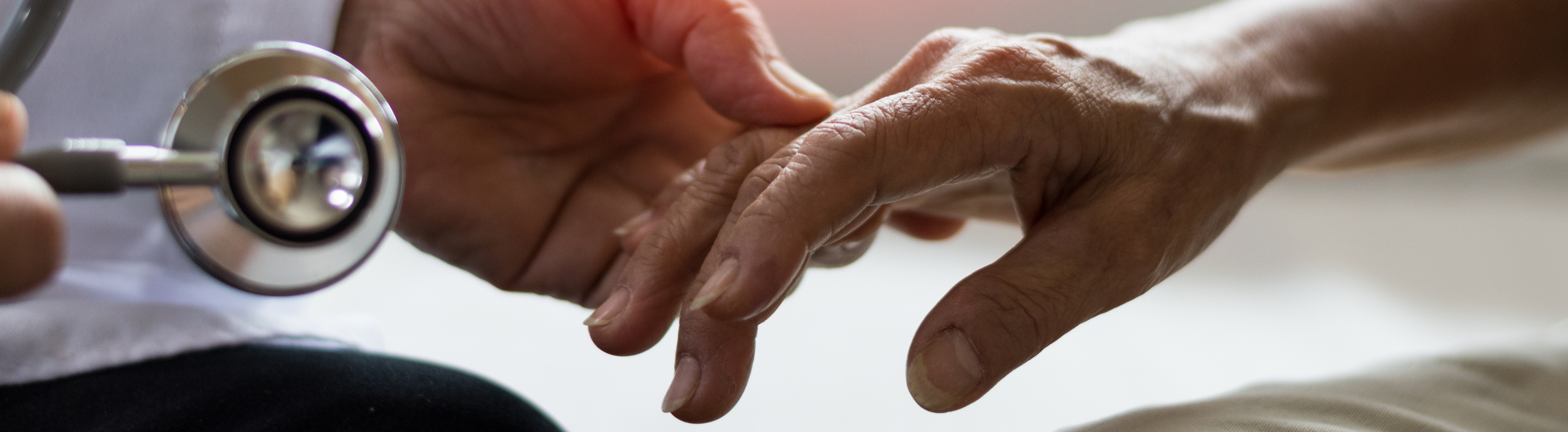Doctor checking patient for Parkinson's Disease